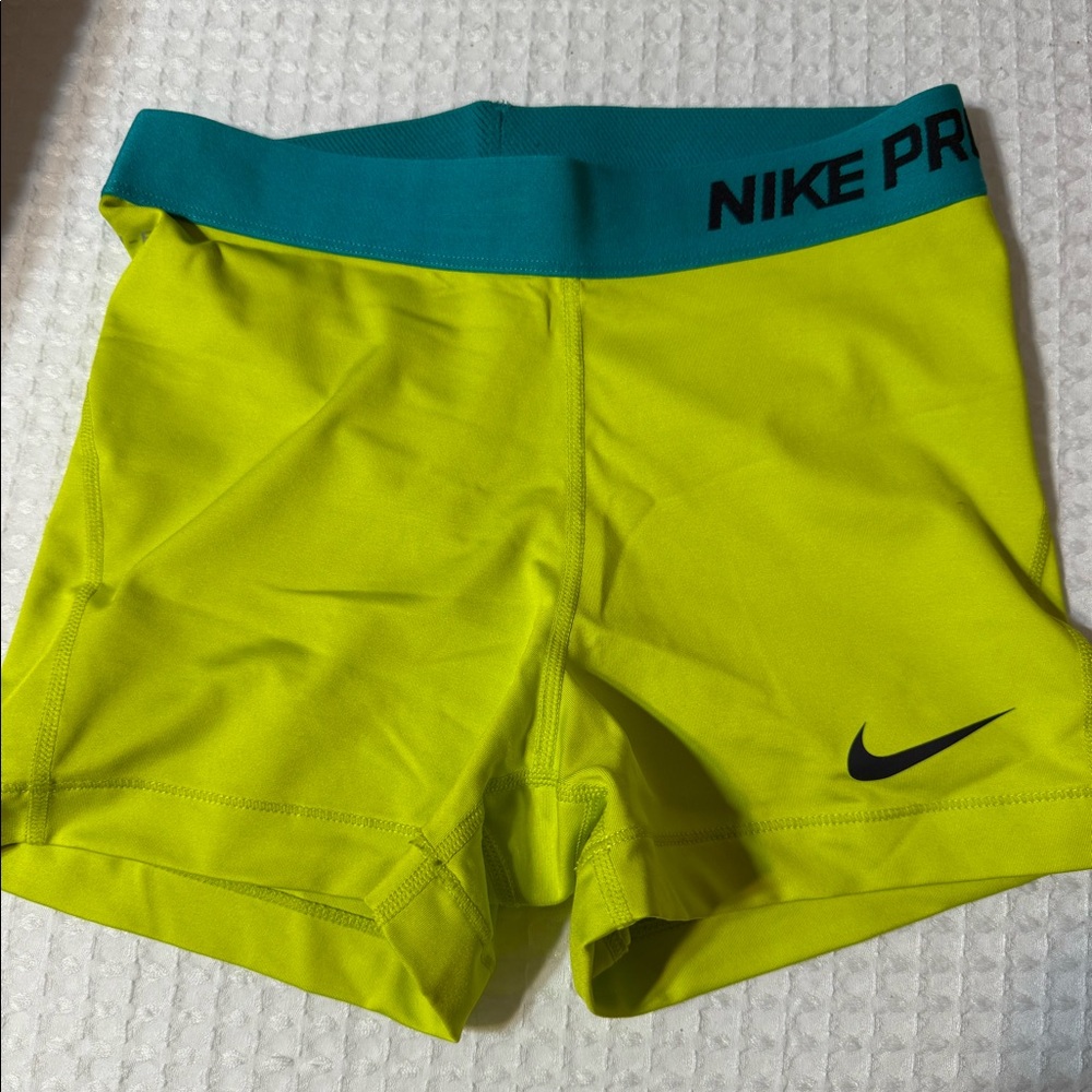 Nike Pros - lime green size medium